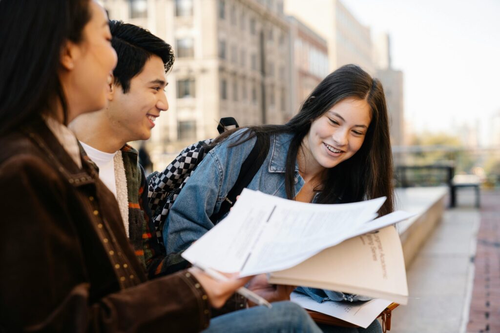 group of students studying outdoors